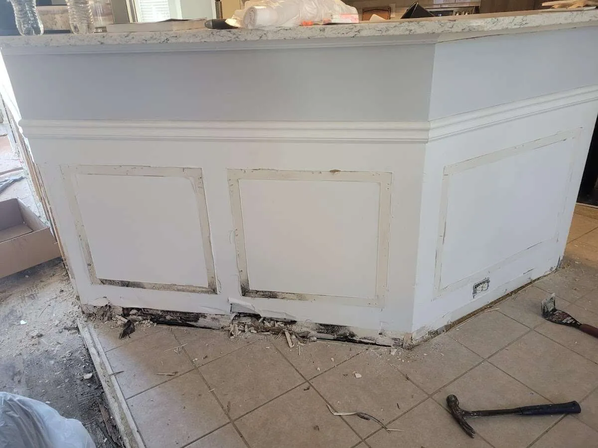 Water damage and mold on kitchen during Storm Damage Restoration in Travis Ranch